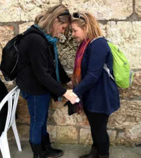 Scenes of participants connecting at the Kotel during the Beutel Leadership 2018