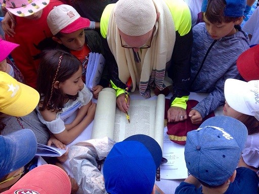 Scene of Torah reading at MacheNetzer summer camp in France July 2018